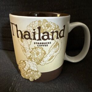 Starbucks THAILAND Coffee Mug 
2009 
16oz
Excellent condition-no chips or cracks